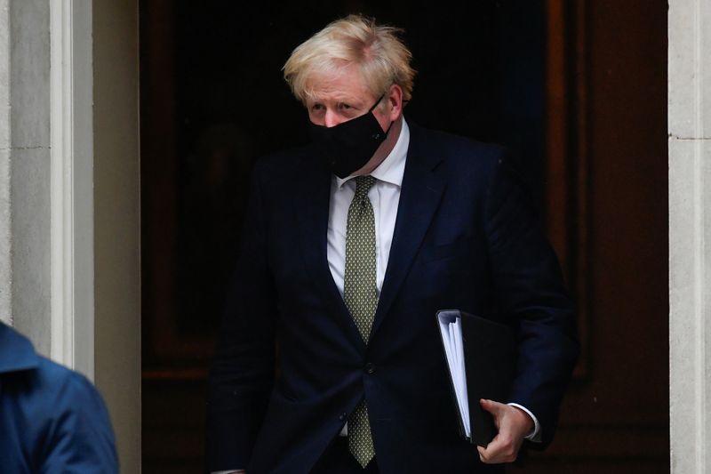 Britain's Prime Minister Boris Johnson leaves Downing Street, in London