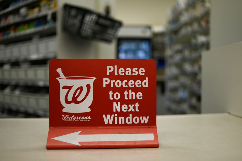 A sign rests on a counter at a Walgreens pharmacy store in Austin, Texas