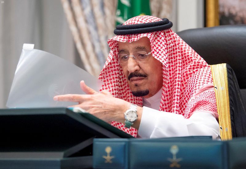 FILE PHOTO: Saudi Arabia's King Salman bin Abdulaziz attends a virtual cabinet meeting in Neom