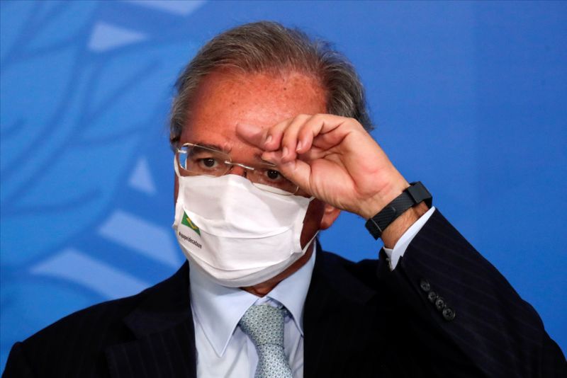 Brazil's Economy Minister Paulo Guedes gestures during the launching ceremony of the Voo Simples program, at the Planalto Palace in Brasilia