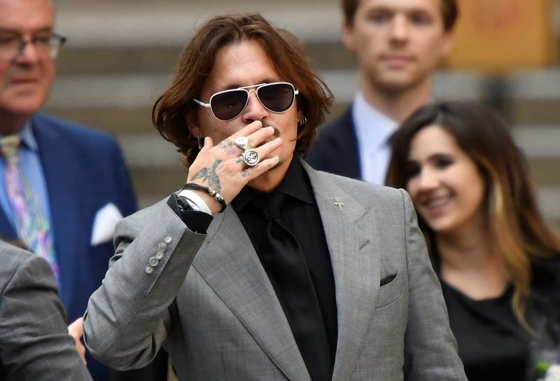 Actors Johnny Depp and Amber Heard at the High Court in London