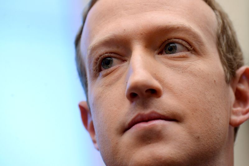FILE PHOTO: Facebook Chairman and CEO Zuckerberg testifies at a House Financial Services Committee hearing in Washington