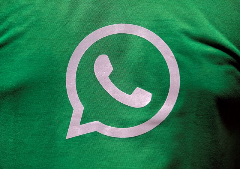 FILE PHOTO: A logo of WhatsApp is pictured on a T-shirt worn by a WhatsApp-Reliance Jio representative during a drive by the two companies to educate users, on the outskirts of Kolkata