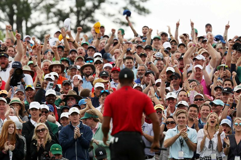 FILE PHOTO: Tiger woods celebrates after winning the 2019 Masters