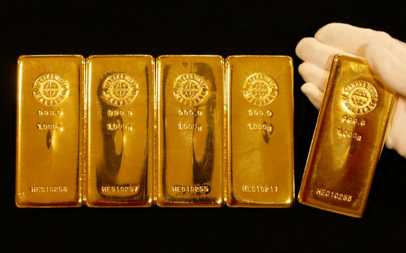 FILE PHOTO: Gold bars are displayed during a photo opportunity at the Ginza Tanaka store in Tokyo