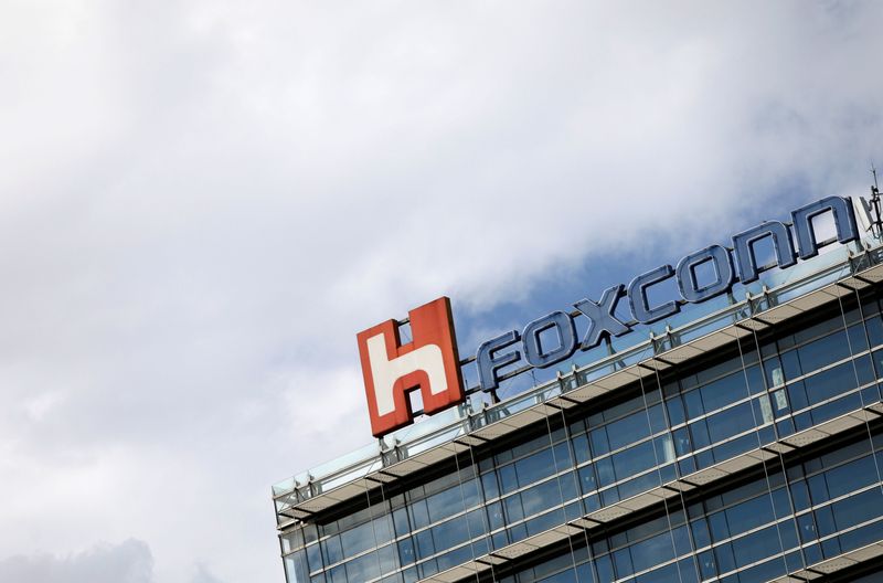 The logo of Foxconn, the trading name of Hon Hai Precision Industry, is seen on top of the company's building in Taipei