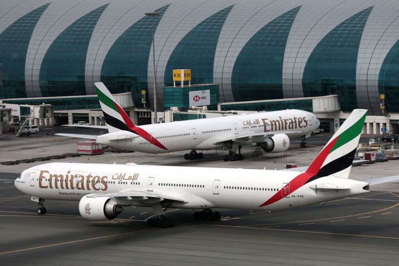 Emirates Airline Boeing 777 planes at are seen Dubai International Airport in Dubai