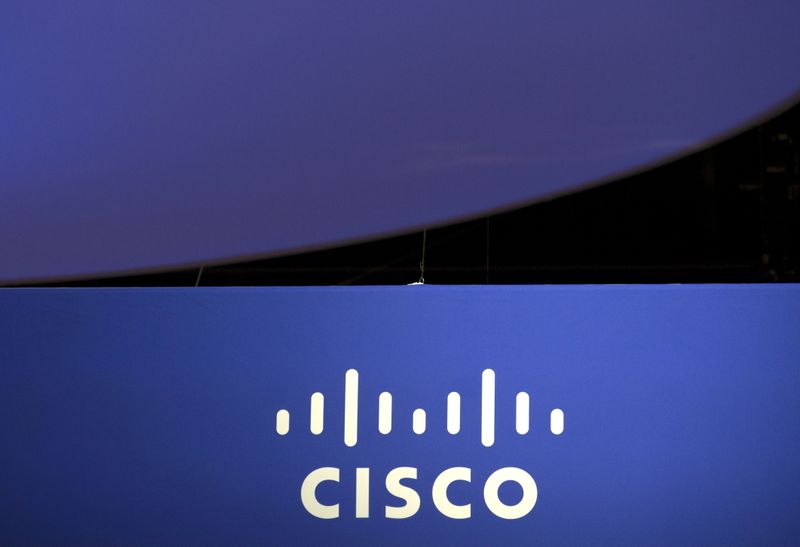 FILE PHOTO: The Cisco Systems logo is seen as part of a display at the Microsoft Ignite technology conference in Chicago