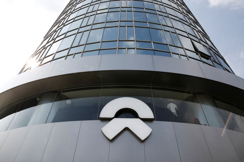 Logo of the electric vehicle maker NIO is seen at its store in Beijin