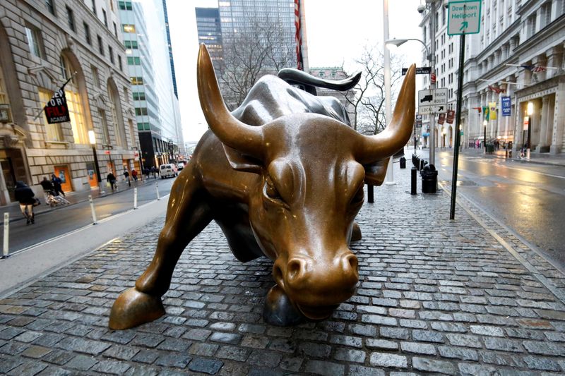 FILE PHOTO: The Wall Street bull is seen in the financial district in New York