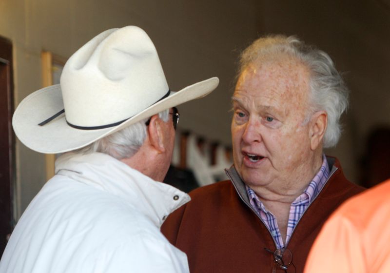 FILE PHOTO: Former Green Bay Packers hall of fame player Paul Hornung talks with Hall of Fame trainer D. Wayne Lukas at Lukas' barn during early morning workouts at Churchill Downs in Louisville