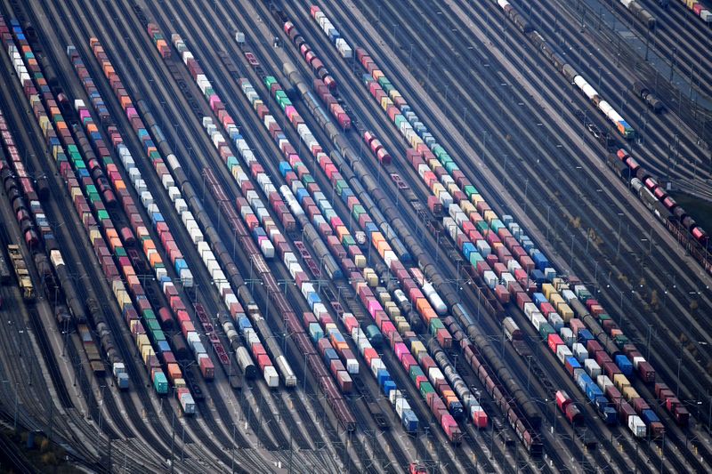 Containers are loaded on freight trains at the railroad shunting yard in Maschen near Hamburg