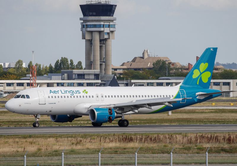 An Aer Lingus Airbus A320 prepares to take off at the builder's headquarters in Colomiers near Toulouse