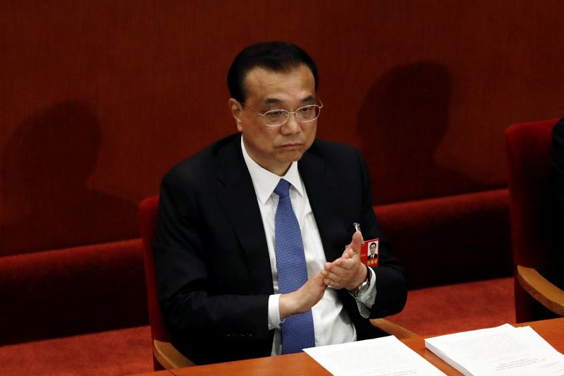 Chinese Premier Li Keqiang attends the closing session of NPC in Beijing