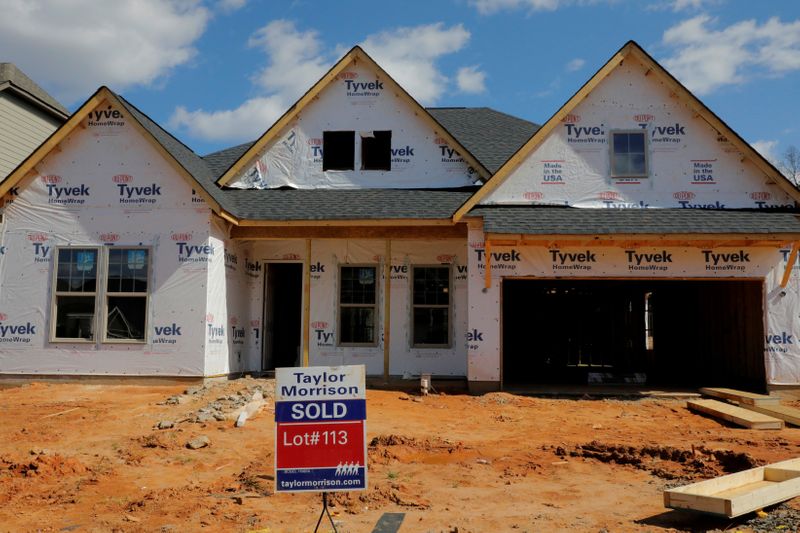 FILE PHOTO: A home under construction stands behind a