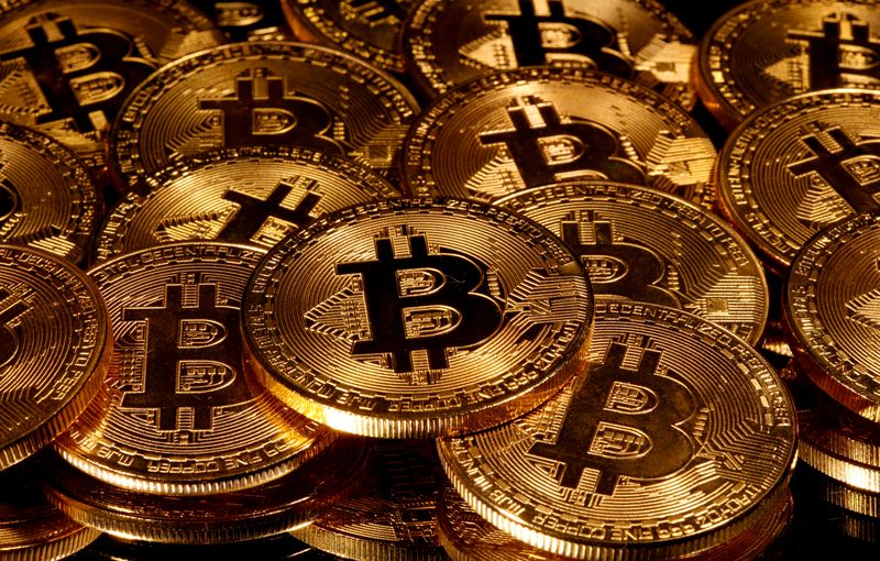 FILE PHOTO: Representations of virtual currency Bitcoin are seen in this picture illustration