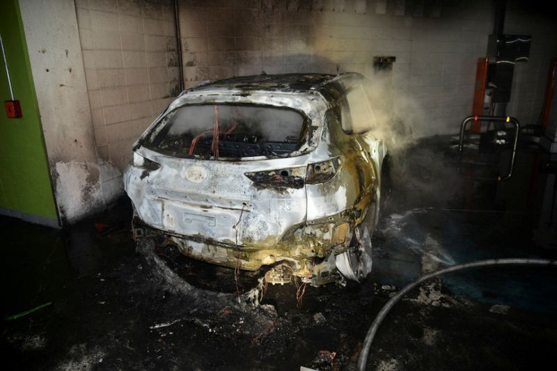 The burnt wreckage of a Hyundai Kona Electric vehicle is seen after it caught fire in Daegu, South Korea