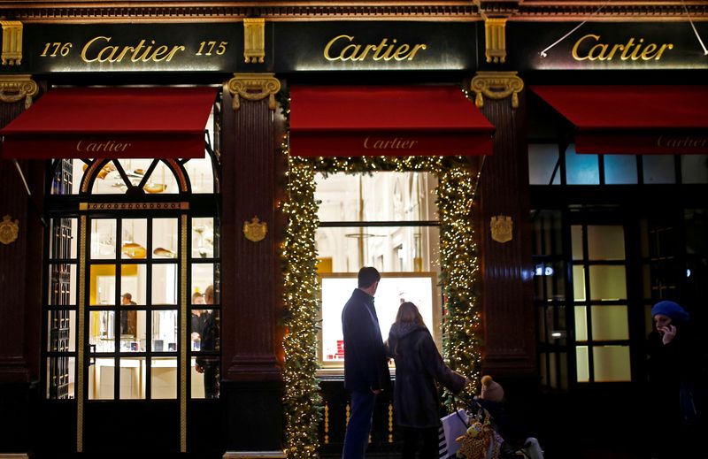 FILE PHOTO: Festive lights decorate the Cartier store on New Bond Street as shoppers do Christmas shopping in central London
