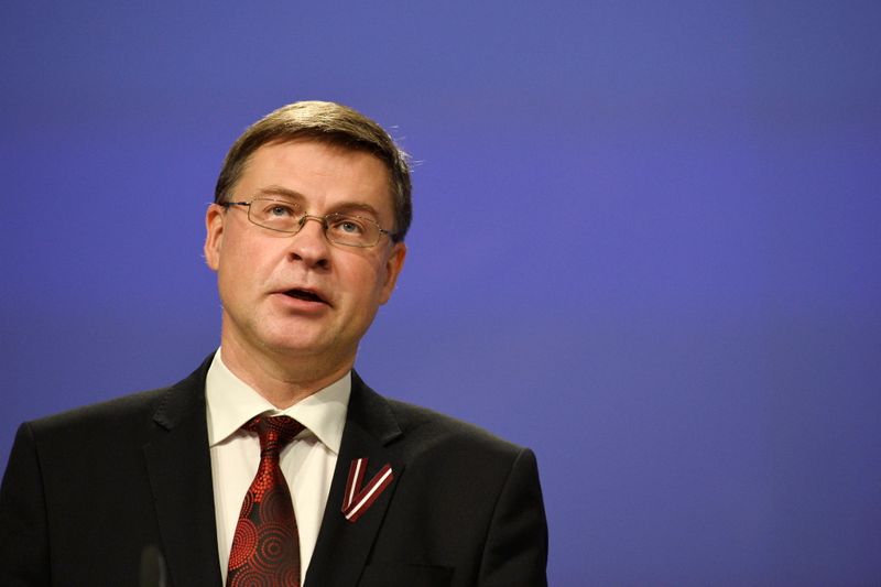 European Commission vice-president Dombrovskis, European Commissioners for Economy Gentiloni and for Jobs and Social Rights Schmit attend a media conference in Brussels
