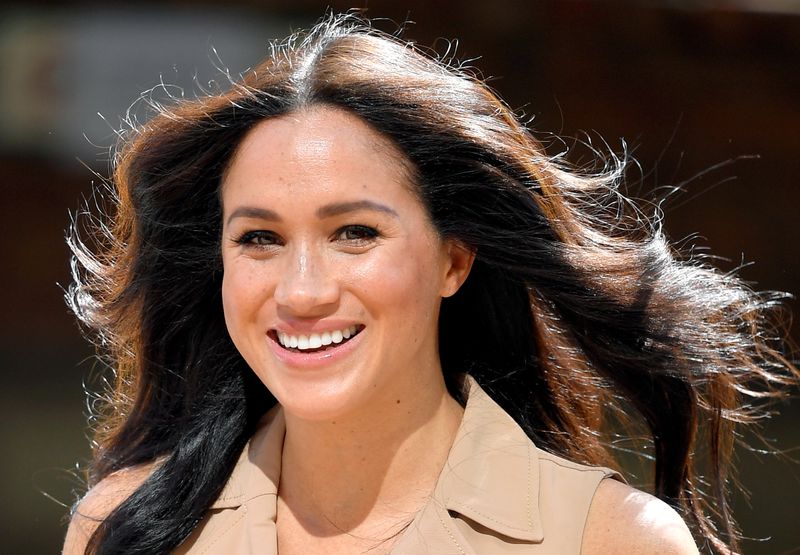 FILE PHOTO: Britain's Meghan Markle, Duchess of Sussex, visits the University of Johannesburg