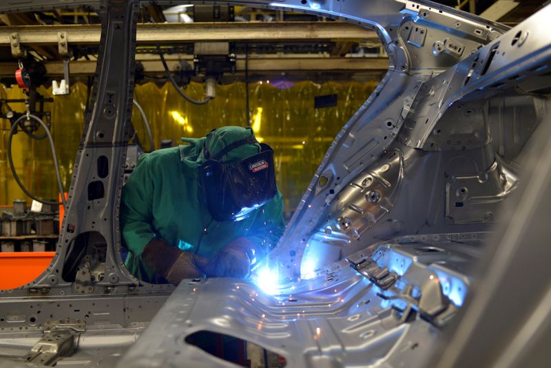 FILE PHOTO: FILE PHOTO: Line workers spot weld parts of the frame on the flex line at Nissan Motor Co's automobile manufacturing plant in Smyrna Tennessee