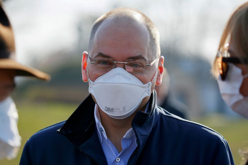 FILE PHOTO: Ukrainian Health Minister Maksym Stepanov stands near a plane as medical personnel depart for coronavirus-hit Italy at an airport in Kyiv