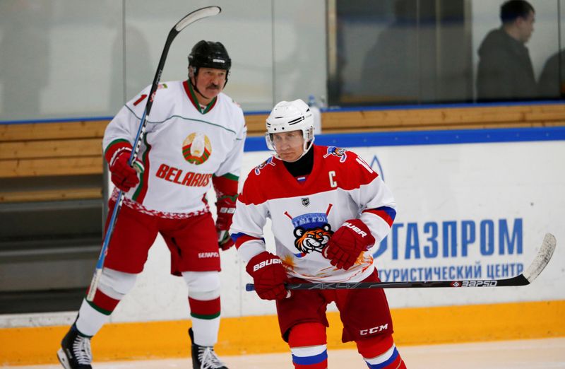 FILE PHOTO: Russian President Vladimir Putin and Belarusian President Alexander Lukashenko take part in a match of the Night Hockey League teams in Rosa Khutor in the Black Sea resort of Sochi