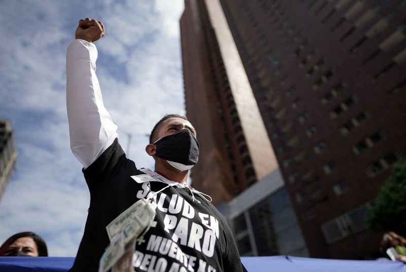 Workers and students participate in a protest against the social and economic policies of Colombia's President Ivan Duque, in Bogota
