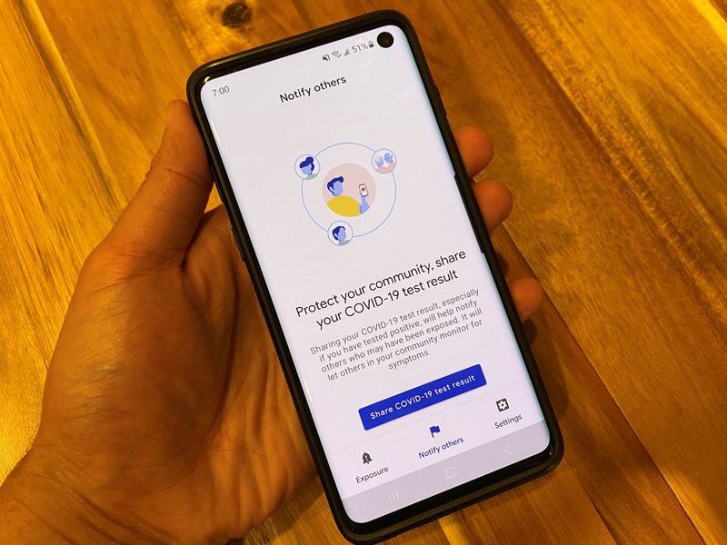 The CA COVID Notify mobile app, an exposure notification app launched by California officials for tracing during the coronavirus disease (COVID-19) outbreak, is seen on an Android phone in a photo illustration in Oakland, California