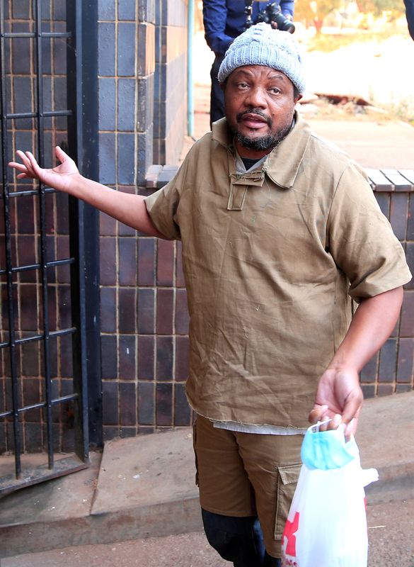 FILE PHOTO: Zimbabwean journalist Hopewell Chin'ono arrives at court in Harare