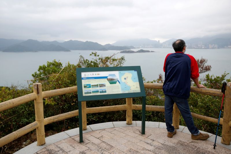 Father of one of the 12 detainees stands on a peak overlooking Yantian district in the neighbouring Chinese mainland city of Shenzhen, in Hong Kong