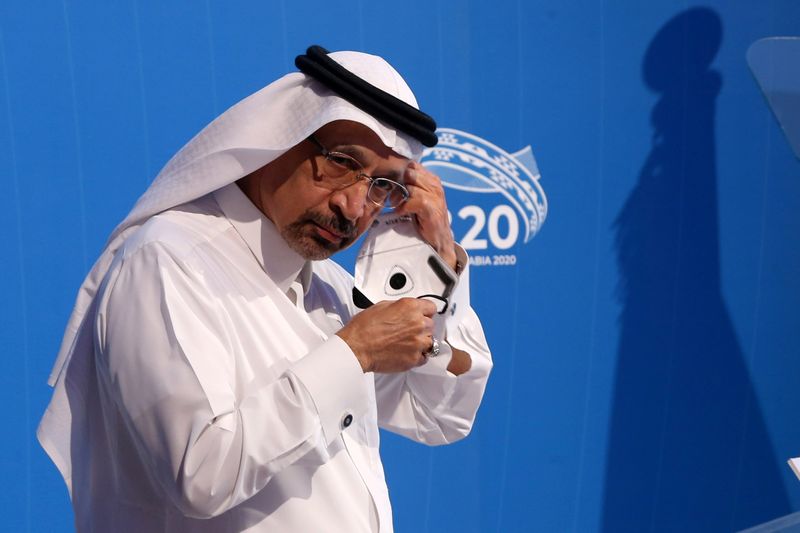 FILE PHOTO: Saudi Arabian Investment Minister Khalid al-Falih, adjusts a mask as he attends a virtual meeting of B20 at the Saudi Business Group summit in Riyadh