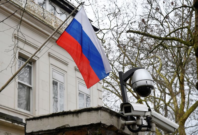 FILE PHOTO: A flag flies outside the consular section of Russia's Embassy in London