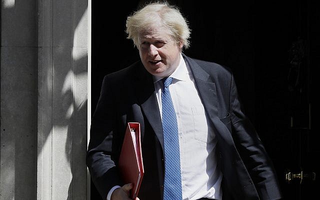 Theresa May defends Brexit plan after Cabinet departures