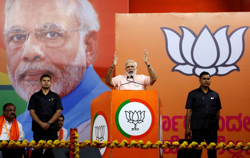 FILE PHOTO: India's Prime Minister Narendra Modi addresses an election campaign rally ahead of the Karnataka state assembly elections in Bengaluru