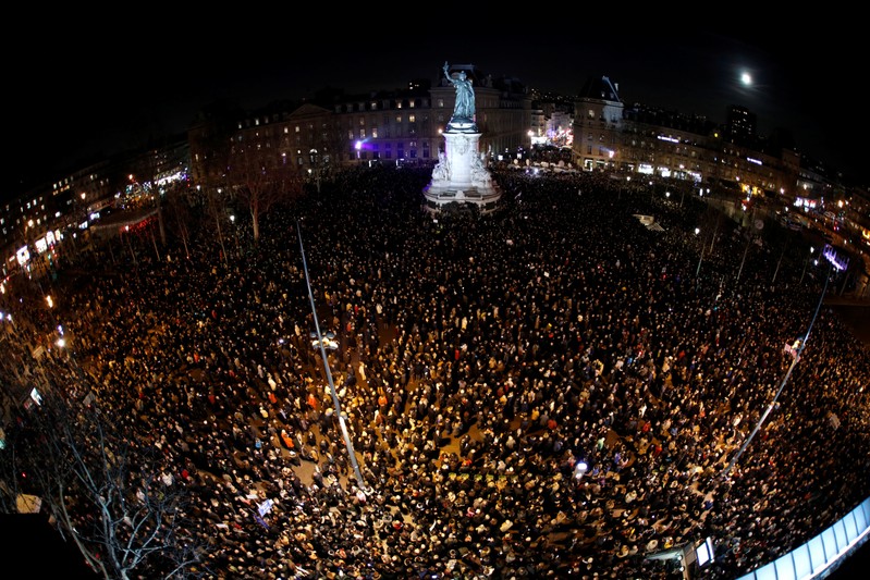 People attend a national gathering to protest antisemitism and the rise of anti-Semitic attacks in the Place de la Republique in Paris