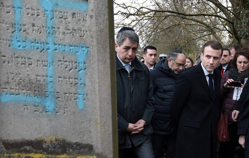 FILE PHOTO: French President Emmanuel Macron visits a Jewish cemetery in Quatzenheim
