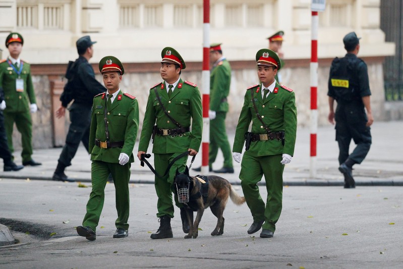Policemen are seen near the Metropole Hotel ahead of the North Korea-U.S. summit in Hanoi