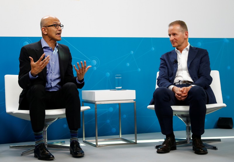 Microsoft CEO Satya Nadella and Volkswagen CEO Herbert Diess address a news conference in Berlin