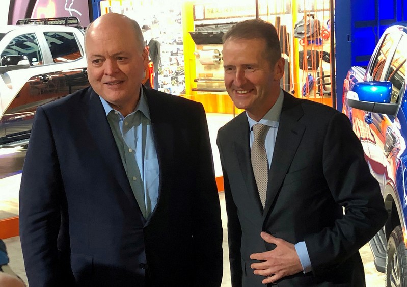 FILE PHOTO: The President and CEO of Ford Motor Company Hackett poses with Volkswagen CEO Diess at the North American International Auto Show in Detroit