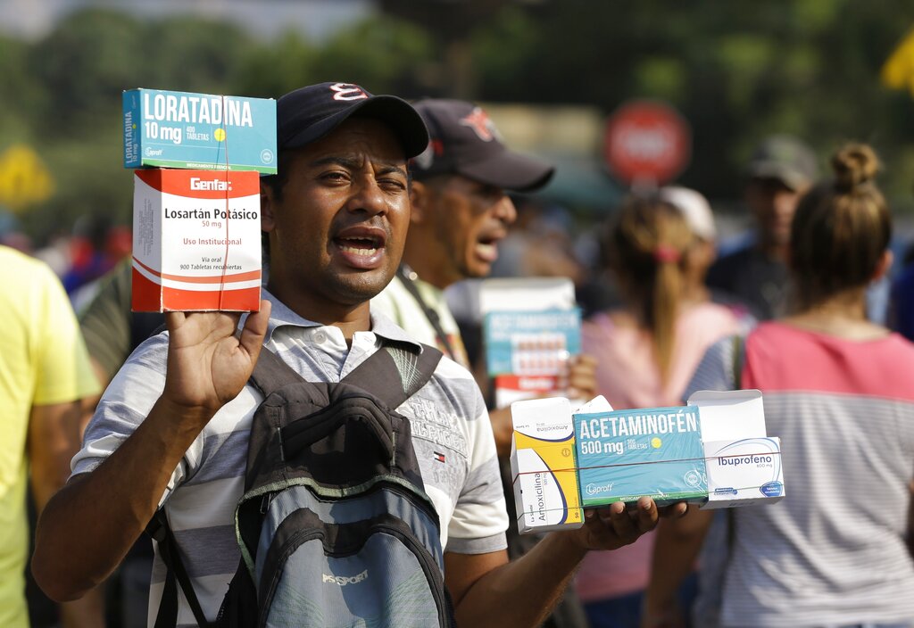 Tensions rise as Venezuela blocks Colombia border bridge in aid standoff Tensions rise as Venezuela blocks Colombia border bridge in aid standoff