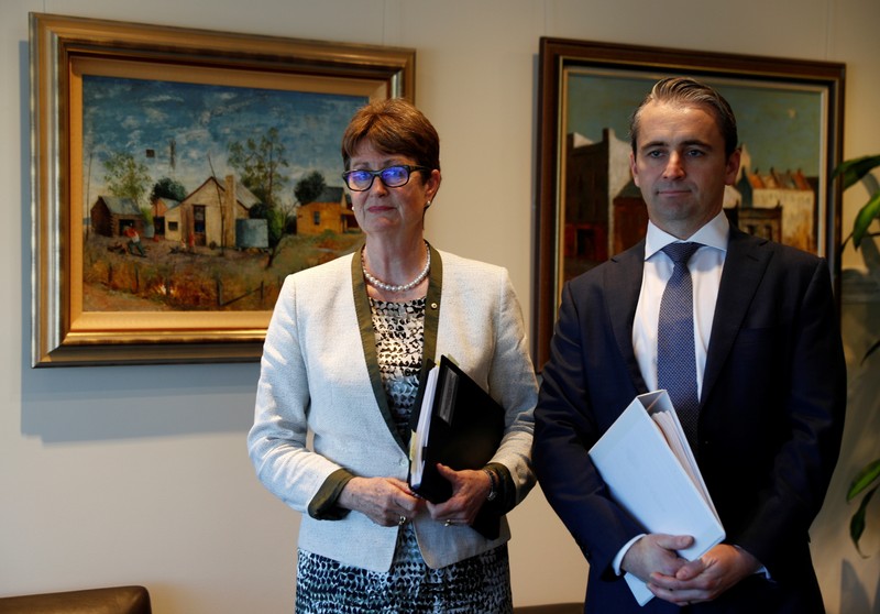 FILE PHOTO: Commonwealth Bank of Australia's Chairman Catherine Livingstone and CEO Matt Comyn pose for the media in their office in Sydney