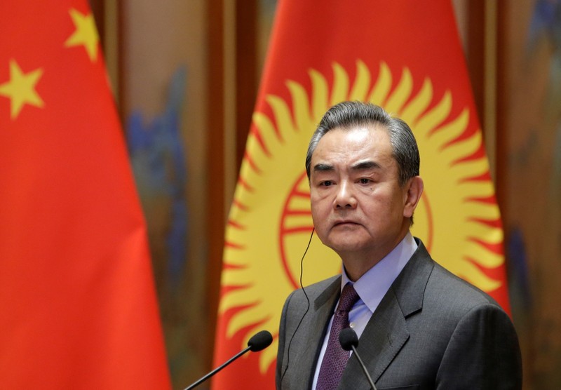 FILE PHOTO: Chinese Foreign Minister Wang Yi attends a joint news conference with Kyrgyzstan's Foreign Minister Chyngyz Aidarbekov in Beijing