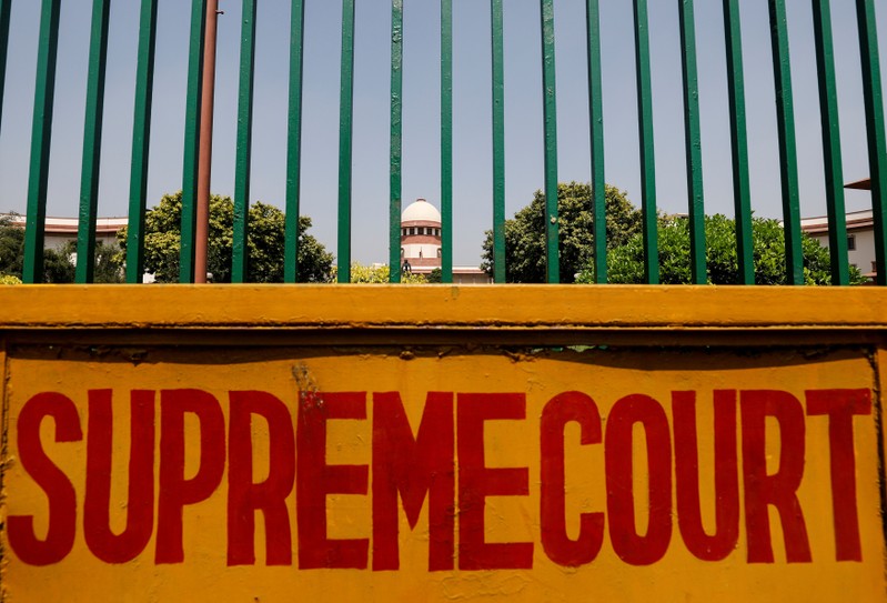 FILE PHOTO: A signboard is seen outside the premises of Supreme Court in New Delhi