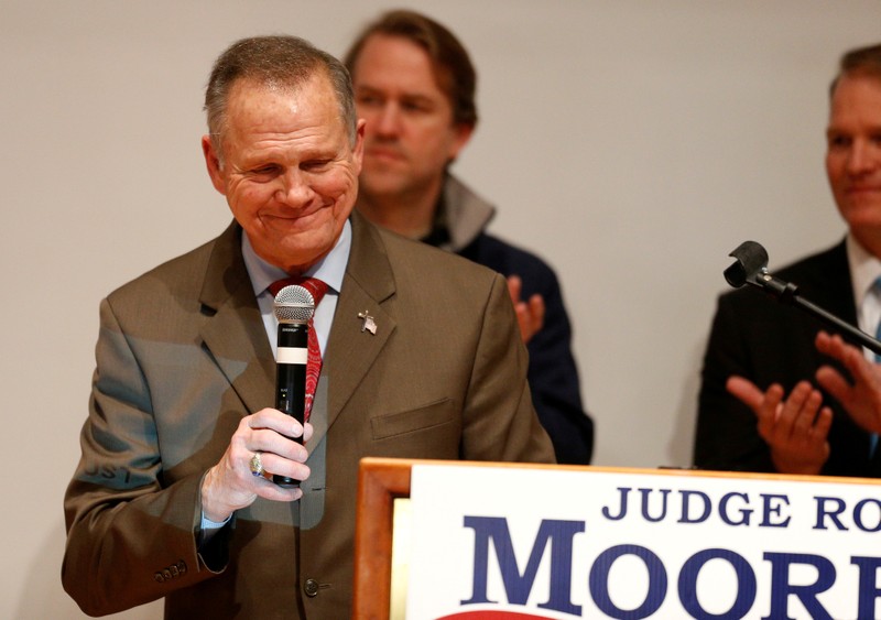 FILE PHOTO: Republican U.S. Senate candidate Roy Moore pauses as he addresses supporters at his election night party in Montgomery