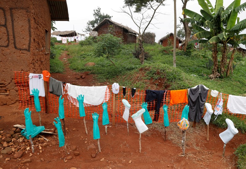 FILE PHOTO: Disinfected healthcare workers' gear dries outside a hospital in Bwana Suri