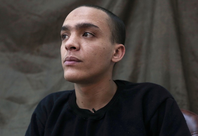 Mounsef al-Mkhayar, 22, an Islamic state fighter of Morrocan descent and Italian citizenship, gestures during an interview with Reuters, in Qamishli