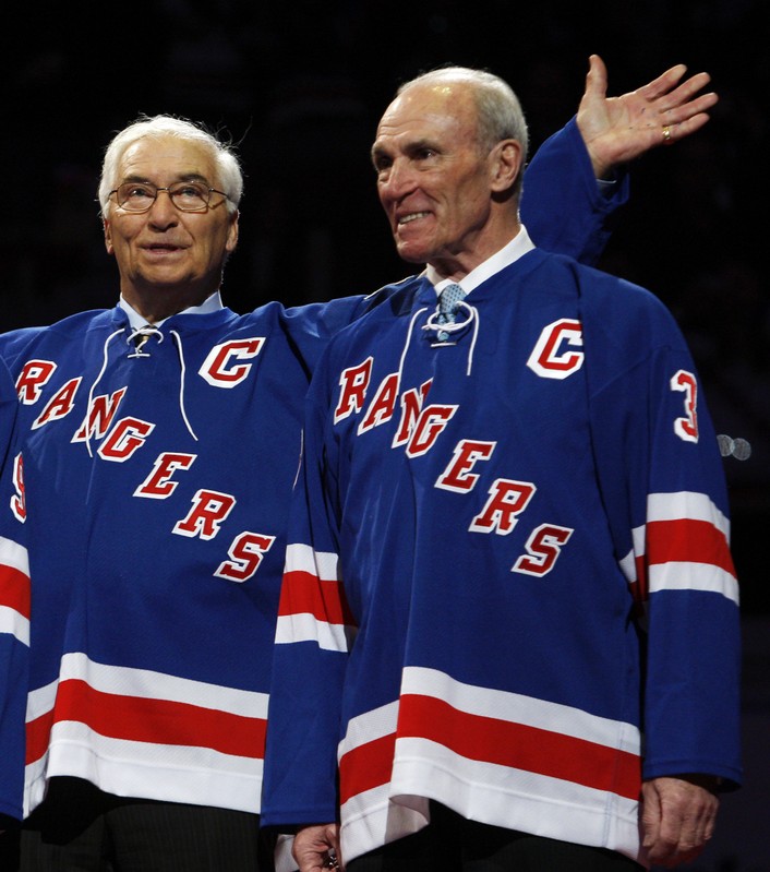 Former New York Rangers Howell and Bathgate smile during number retirement ceremony before Rangers' game against Maple Leafs in New York