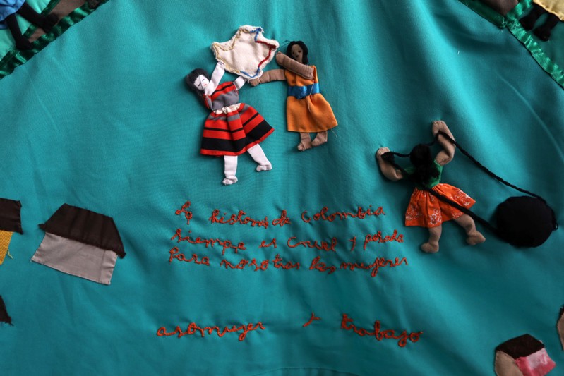 A cloth embroidered by the victims of the armed conflict in Colombia, with the phrase that reads: