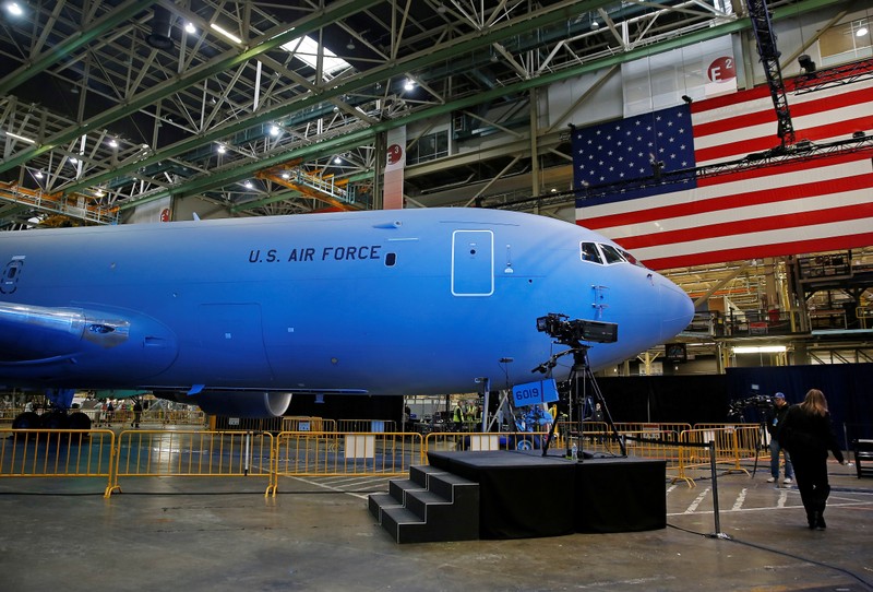 FILE PHOTO: The Boeing KC-46 Pegasus aerial refueling tanker is bathed in blue light before a delivery celebration to the U.S. Air Force in Everett, Washington